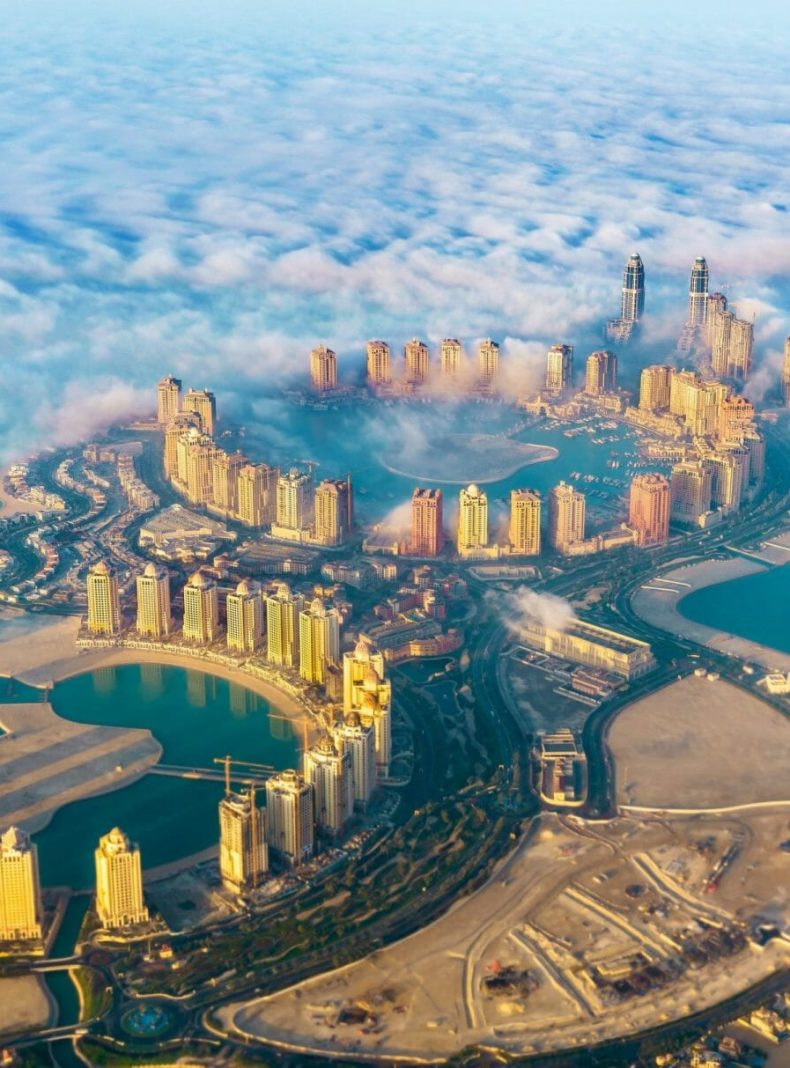 Aerial view of the Pearl-Qatar island in Doha through the morning fog - Qatar, the Persian Gulf